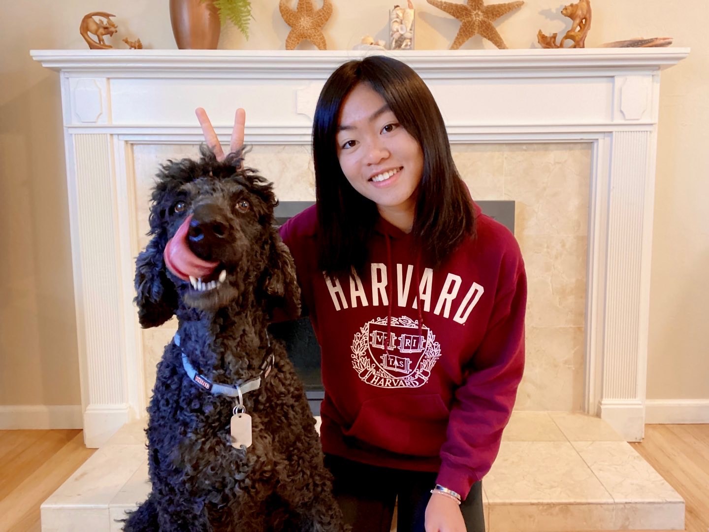 Astro posing together in front of the fireplace